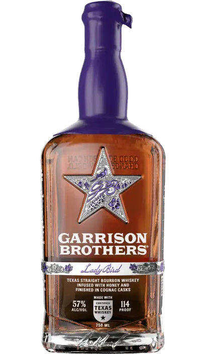  Garrison Brothers Lady Bird Bourbon, 750ml bottle, showcasing its rich amber color and elegant label, finished in a cognac cask, set against a subtly textured background emphasizing its Texas origin