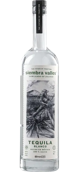 Siembra Valles Tequila Blanco 750ml bottle, showcasing its sleek, clear glass design with a label that features the vibrant blue of the agave plant, positioned against a backdrop that enhances the natural, pure essence of the tequila.
