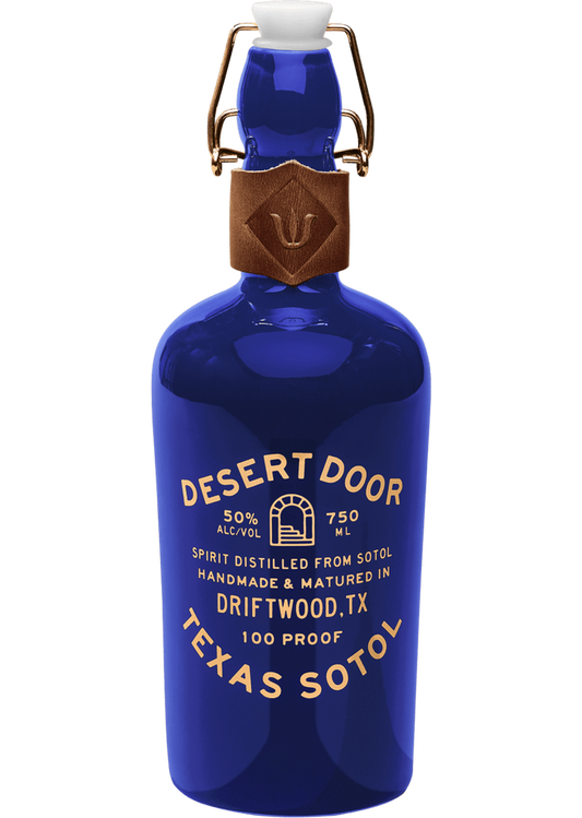 Desert Door Sotol 100 Proof Texas 750ml, featuring a sleek, dark blue bottle with the Desert Door logo, highlighting the premium wild-harvested sotol spirit made from the Desert Spoon plant in Texas.